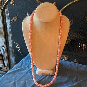 Vintage long Coral Pink Iridescent Beaded Necklace with brass latch.